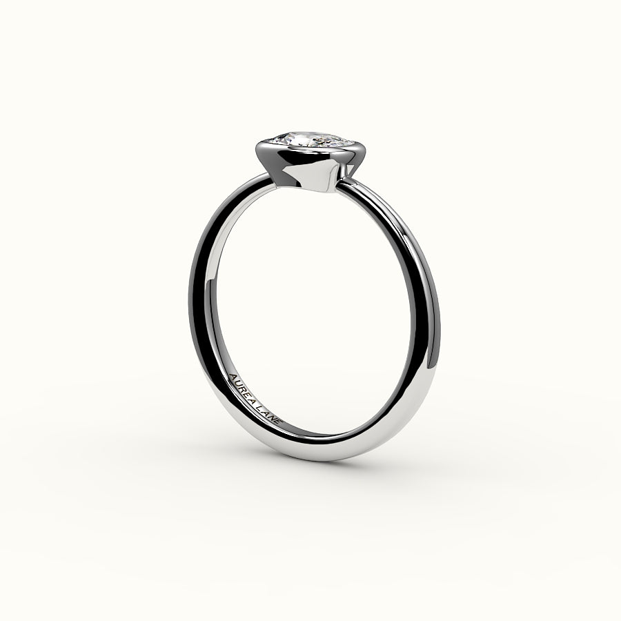 East-West Elongated Cushion Bezel Ring Setting