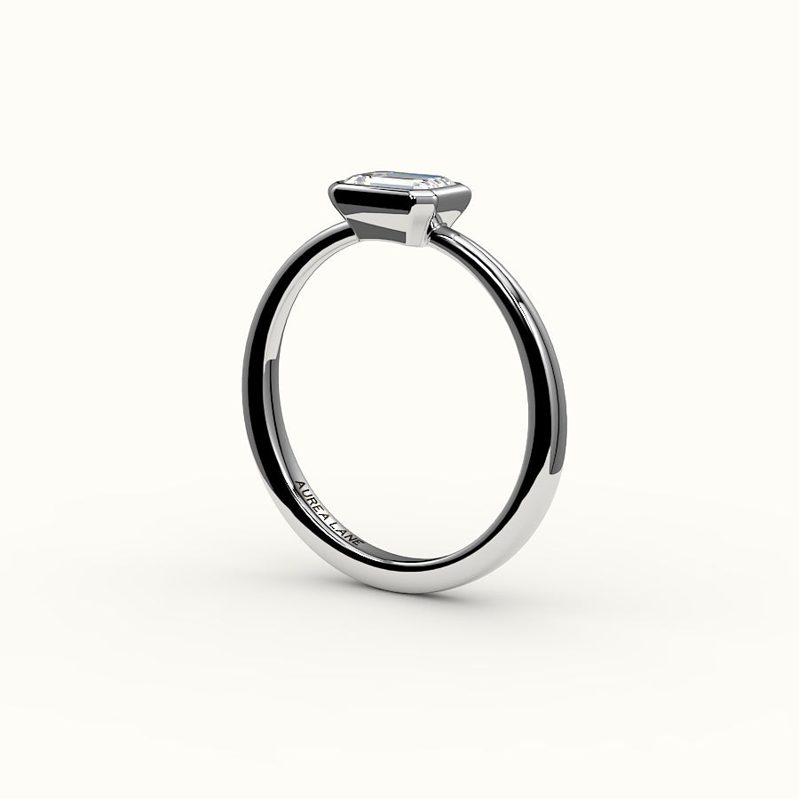 East-West Emerald Cut Bezel Ring Setting