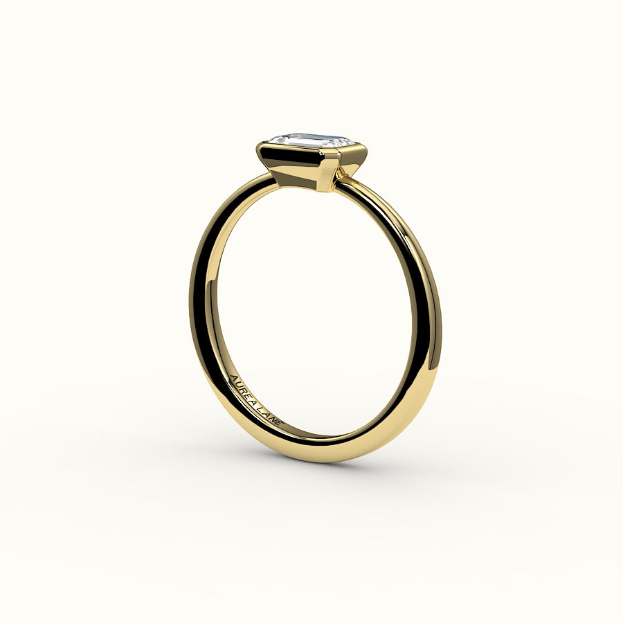 East-West Emerald Cut Bezel Ring Setting
