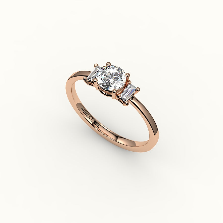 Round Cut Three-Stone Setting with Vertical Baguettes