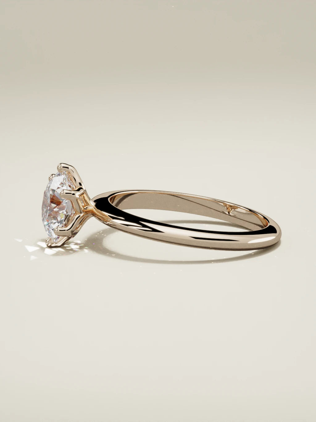 The Dalia, solitario con diamante redondo de laboratorio en oro rosa 14K, vista lateral