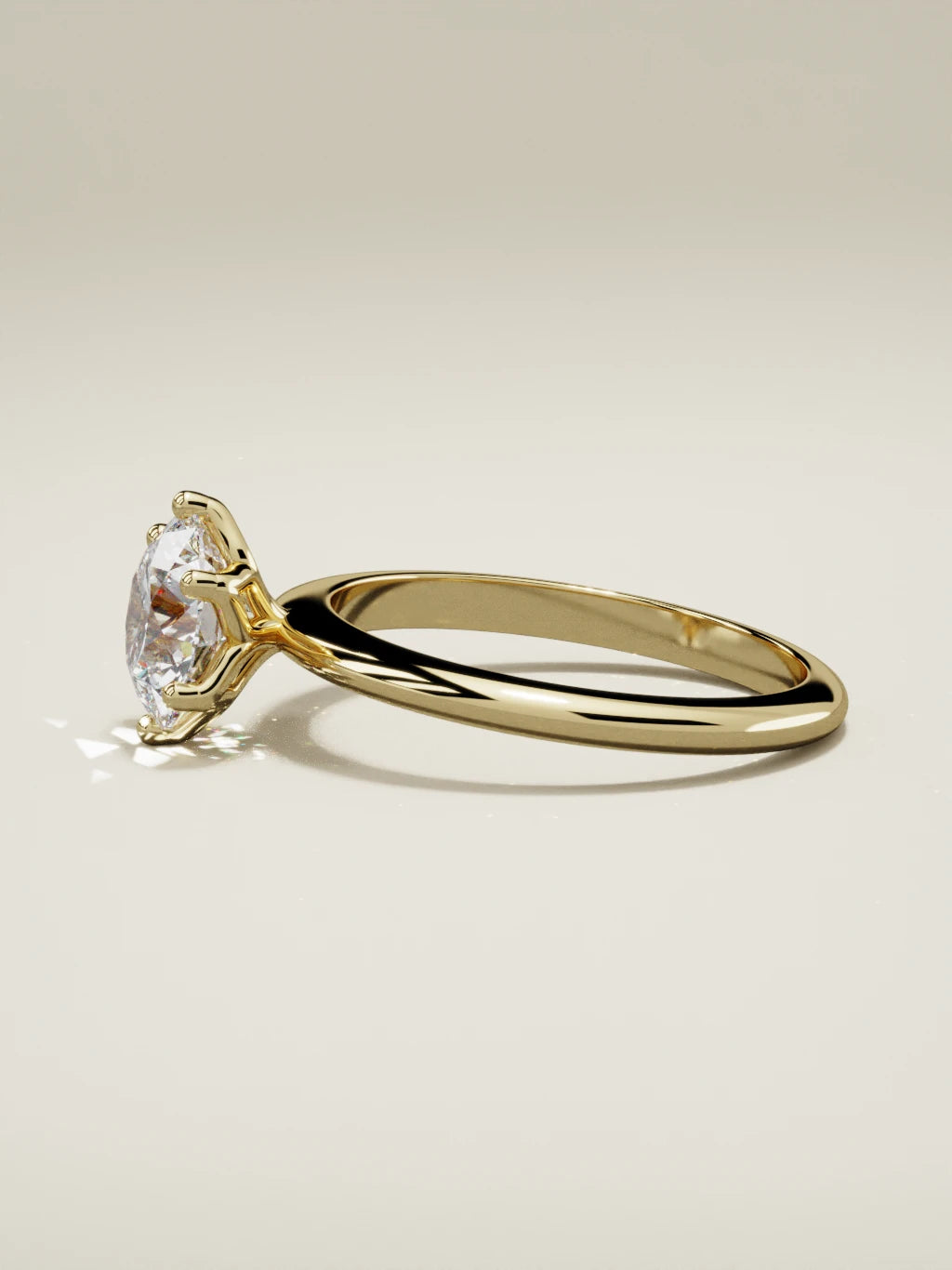 The Dalia, solitario con diamante redondo de laboratorio en oro amarillo 14K, vista lateral
