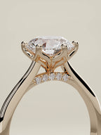 The Iris round lab-grown diamond solitaire in 14K rose gold, standing three-quarter view