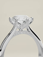 The Iris round lab-grown diamond solitaire in 14K white gold, standing three-quarter view