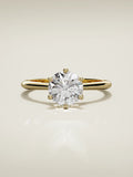 The Iris round lab-grown diamond solitaire in 14K yellow gold, front view