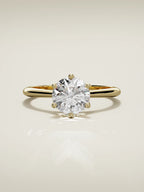 The Iris round lab-grown diamond solitaire in 14K yellow gold, front view