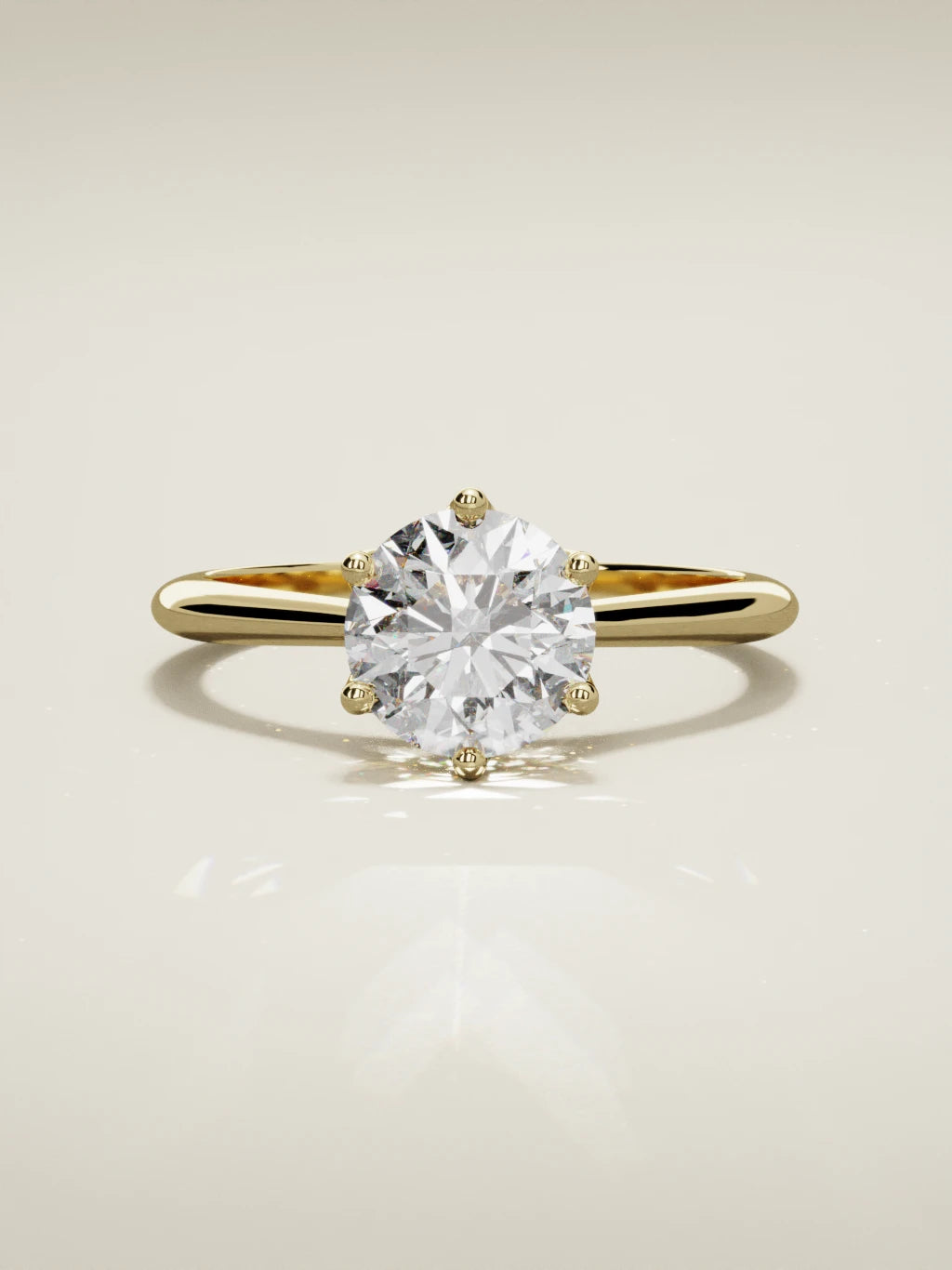 The Iris round lab-grown diamond solitaire in 14K yellow gold, front view