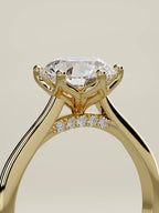 The Iris round lab-grown diamond solitaire in 14K yellow gold, standing three-quarter view