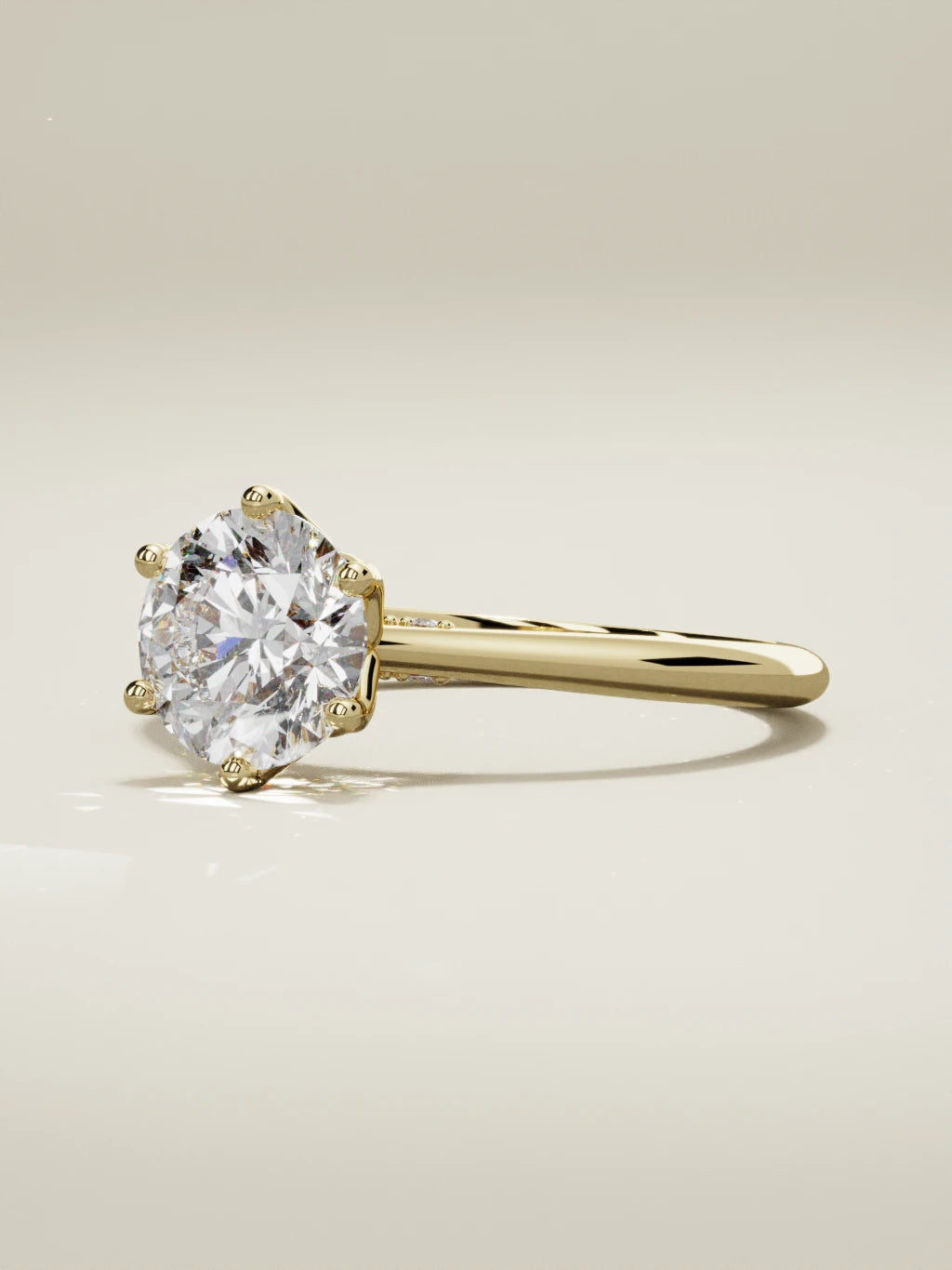The Iris round lab-grown diamond solitaire in 14K yellow gold, three-quarter view