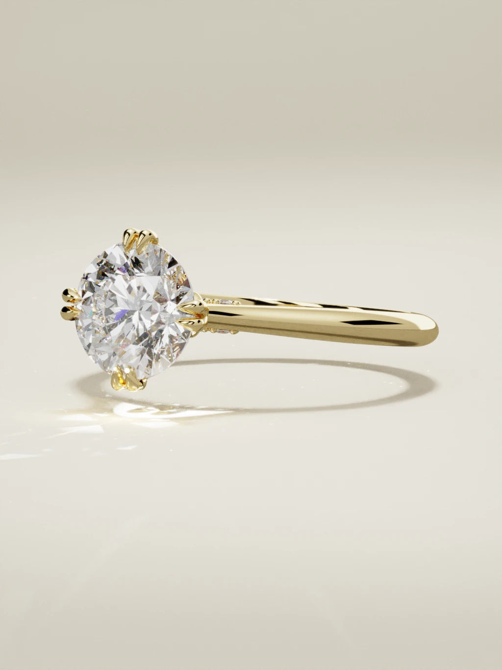 The Jazmin, solitario con diamante redondo de laboratorio en oro amarillo 14K, vista de tres cuartos