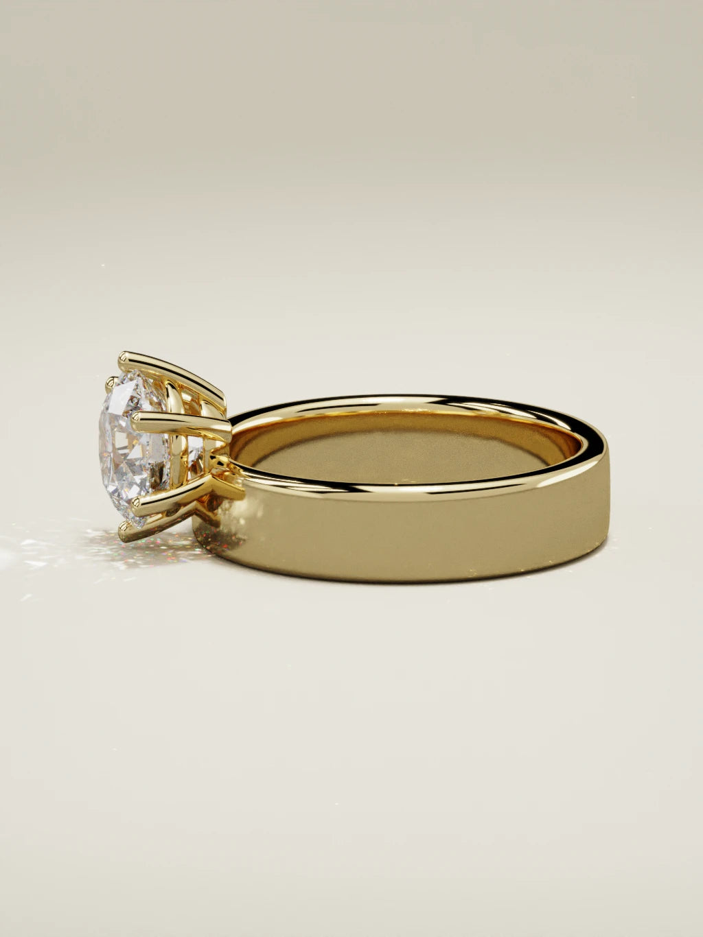 The Joya, solitario con diamante redondo de laboratorio en oro amarillo 14K, vista lateral