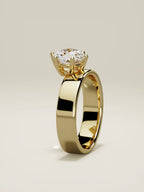The Joya, solitario con diamante redondo de laboratorio en oro amarillo 14K, de pie, vista frontal