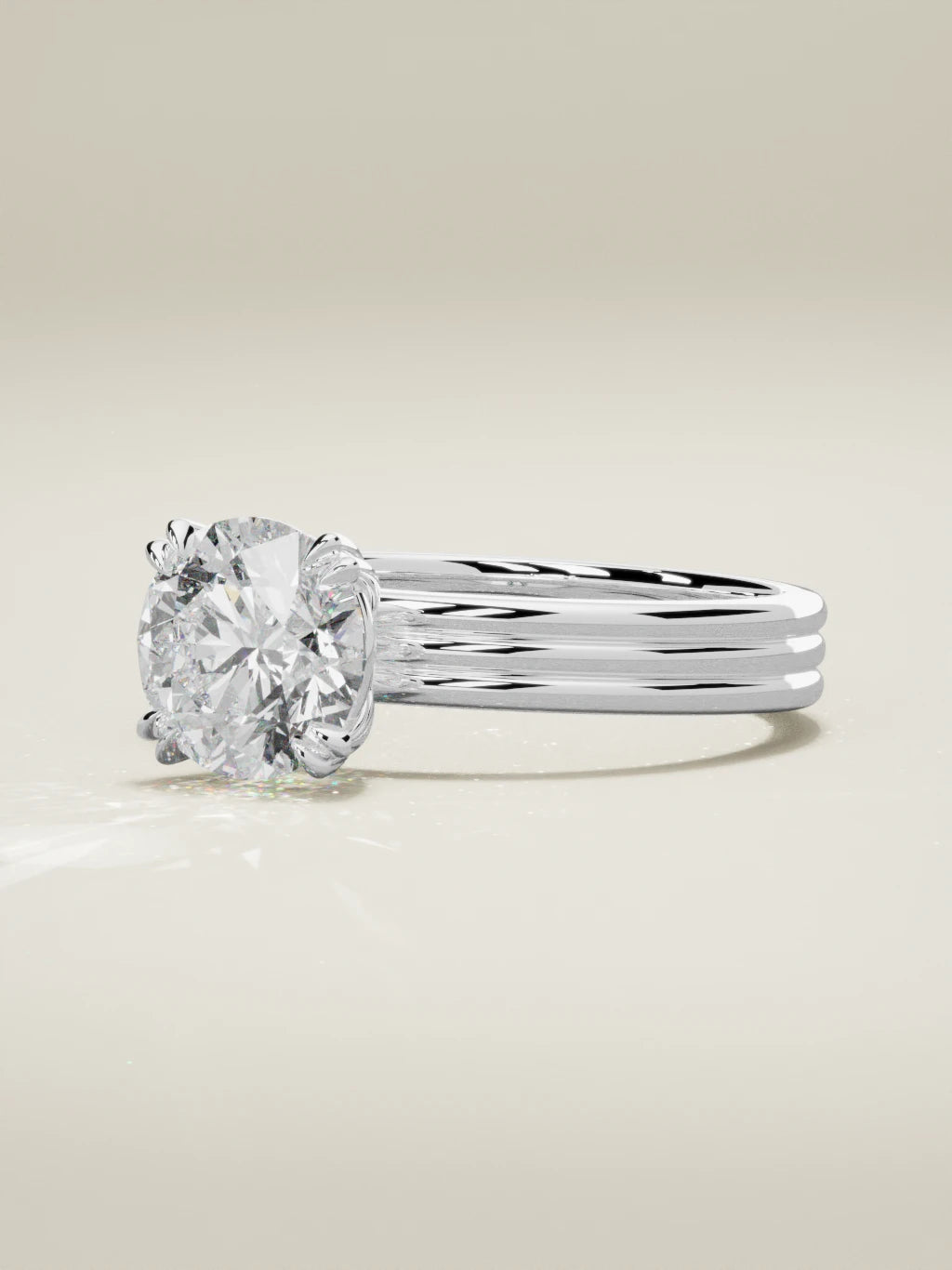 The Lira, solitario con diamante redondo de laboratorio en oro blanco 14K, vista de tres cuartos