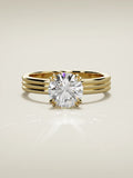 The Lira, solitario con diamante redondo de laboratorio en oro amarillo 14K, vista frontal