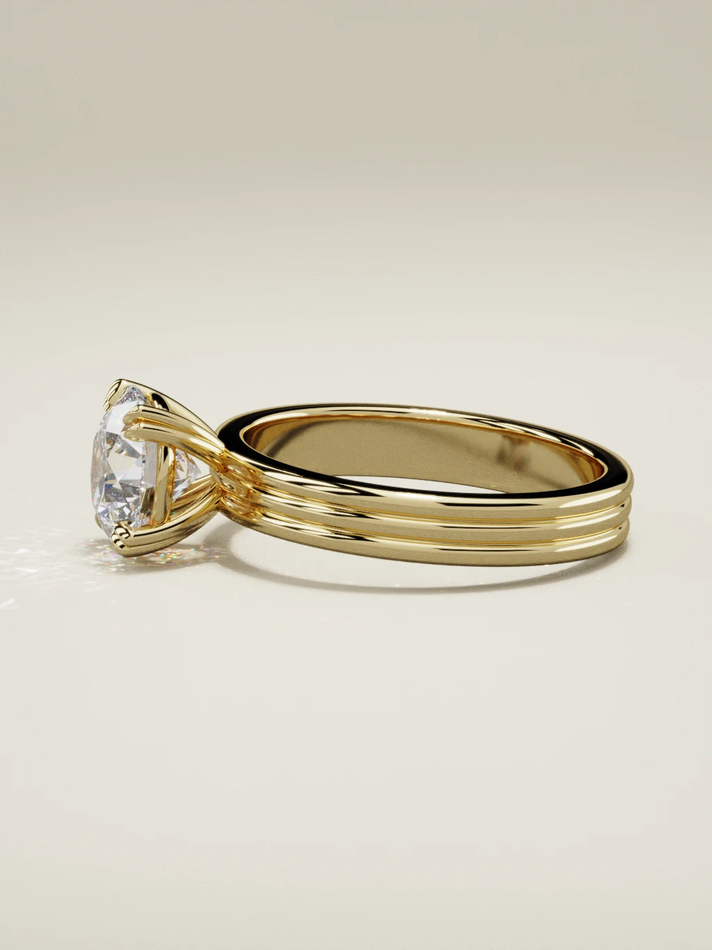 The Lira, solitario con diamante redondo de laboratorio en oro amarillo 14K, vista lateral