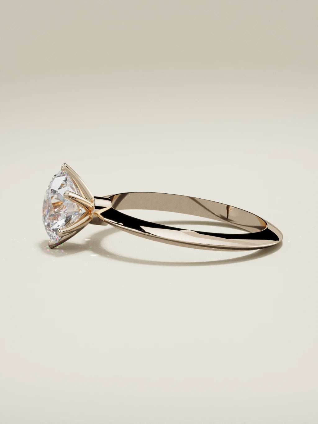 The Prisma, solitario con diamante redondo de laboratorio en oro rosa 14K, vista lateral