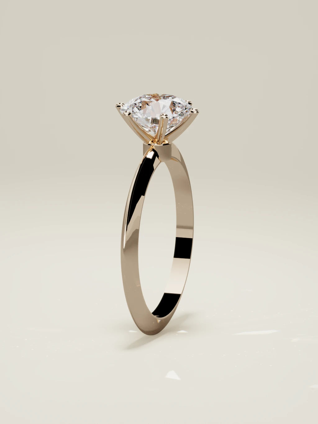 The Prisma, solitario con diamante redondo de laboratorio en oro rosa 14K, de pie, vista frontal