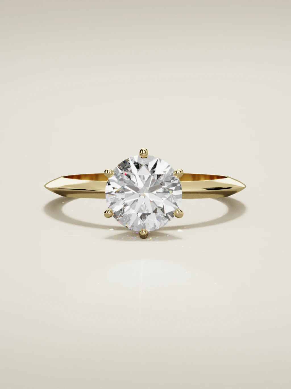 The Prisma, solitario con diamante redondo de laboratorio en oro amarillo 14K, vista frontal