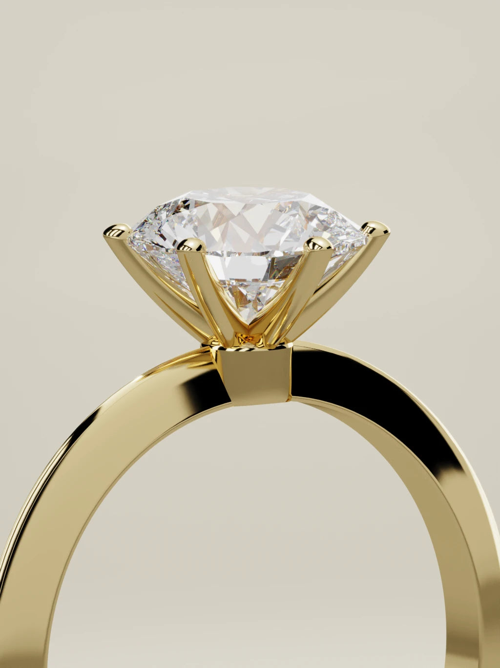 The Prisma, solitario con diamante redondo de laboratorio en oro amarillo 14K, de pie, vista de tres cuartos