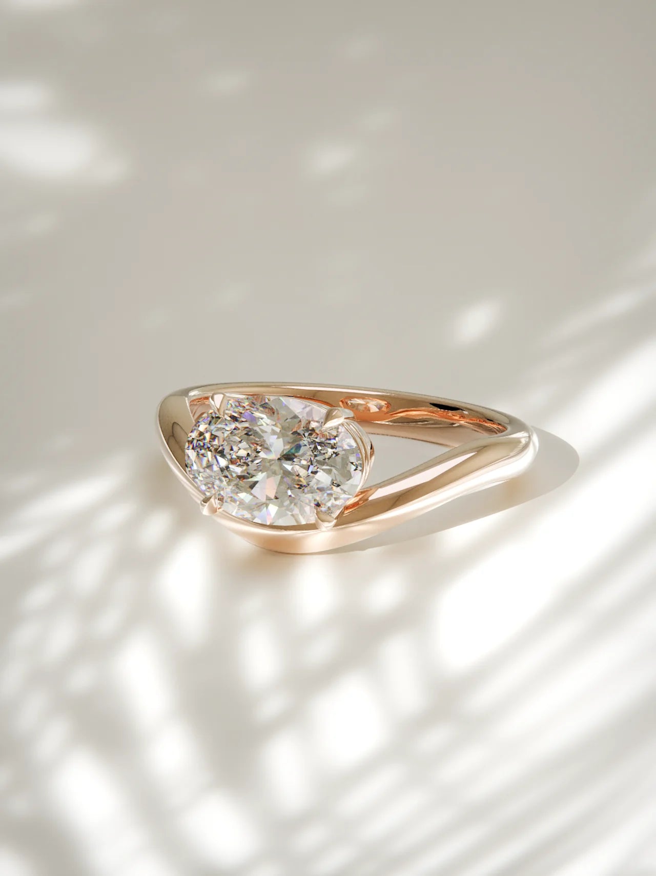 The Arco | East West Oval Solitaire