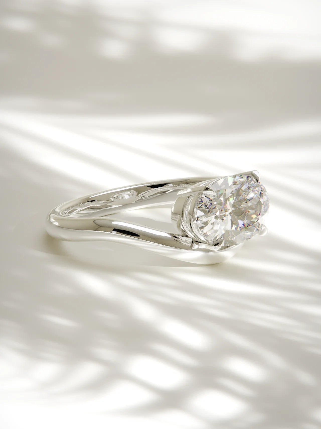 The Arco | East West Oval Solitaire
