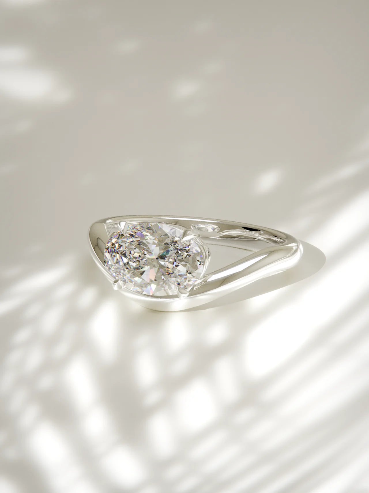 The Arco | East West Oval Solitaire