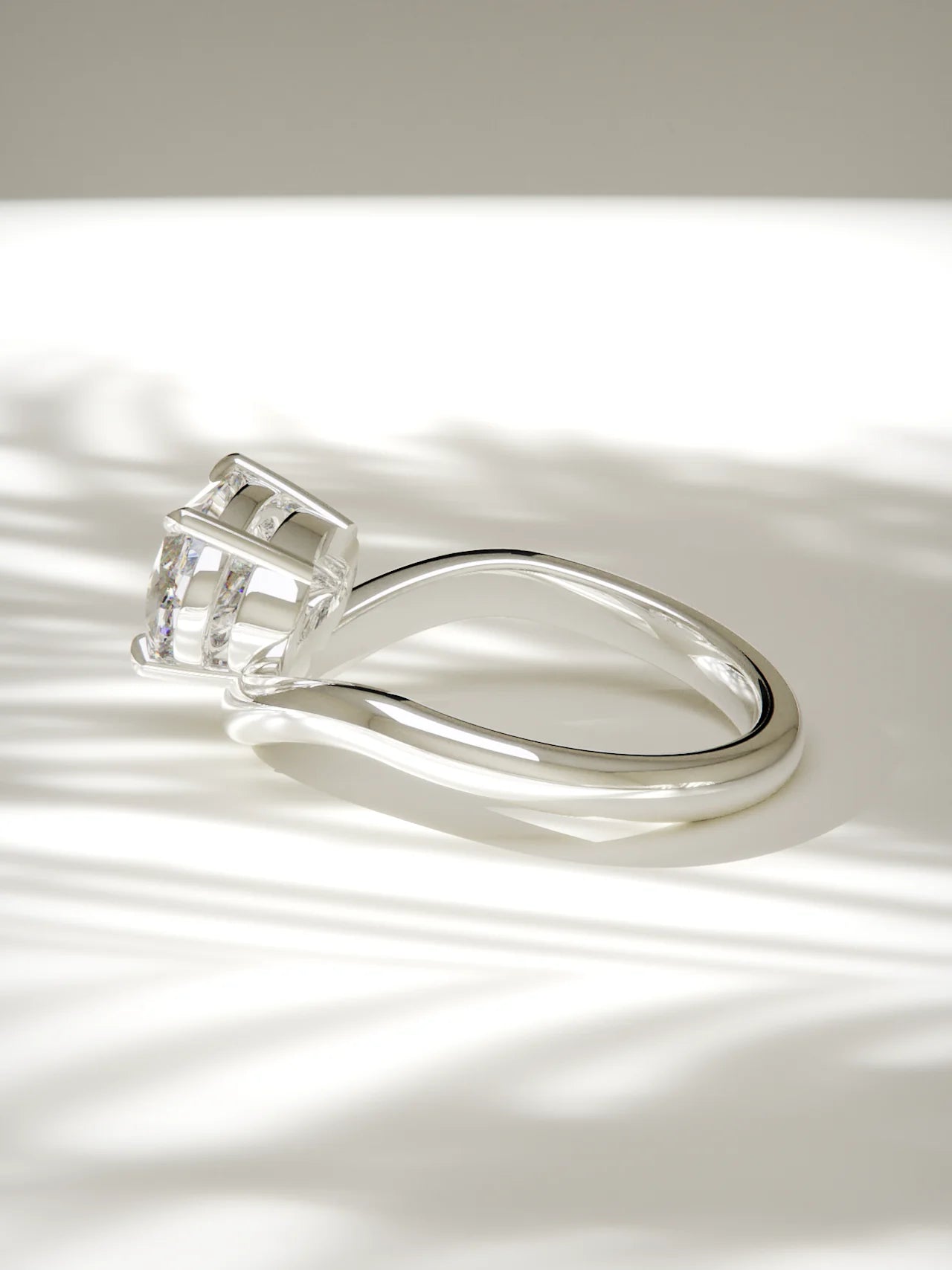 The Arco | East West Oval Solitaire