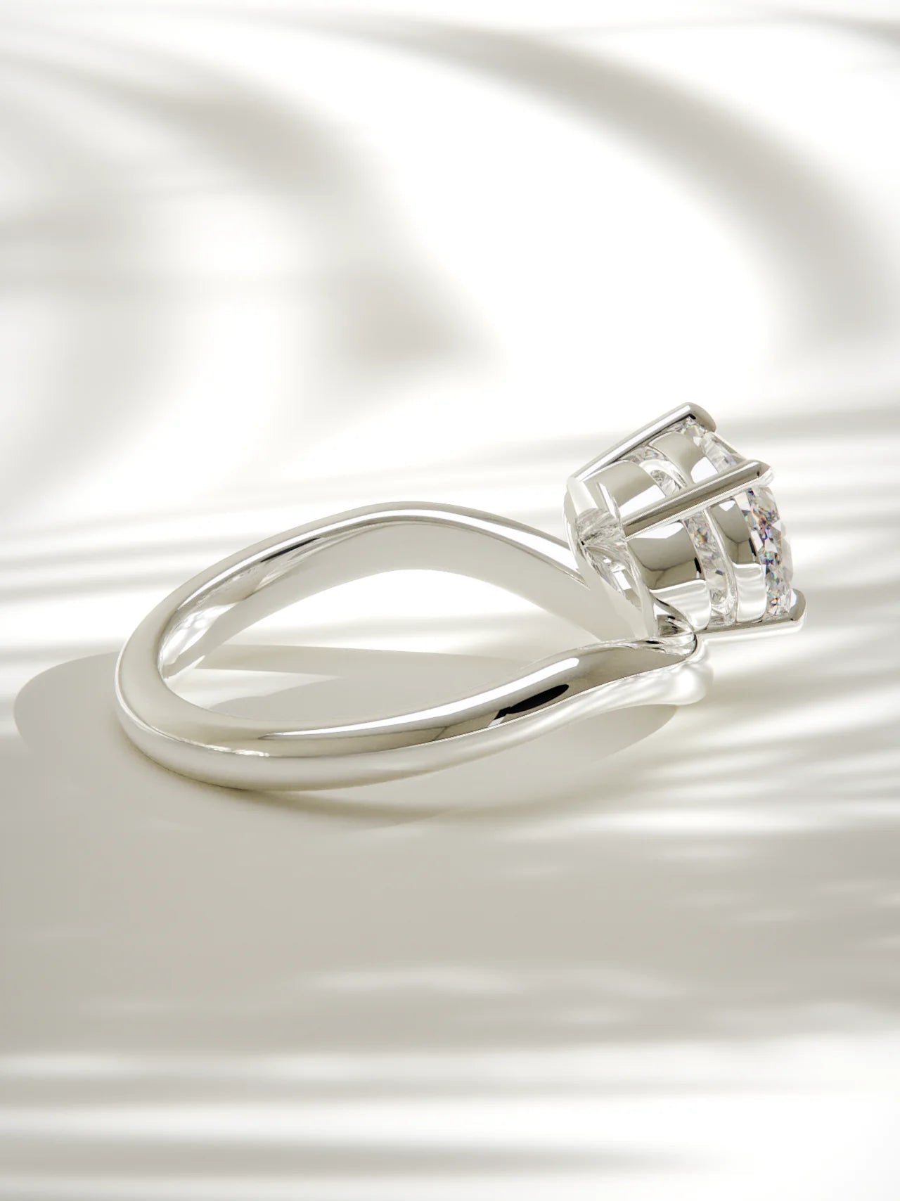 The Arco | East West Oval Solitaire