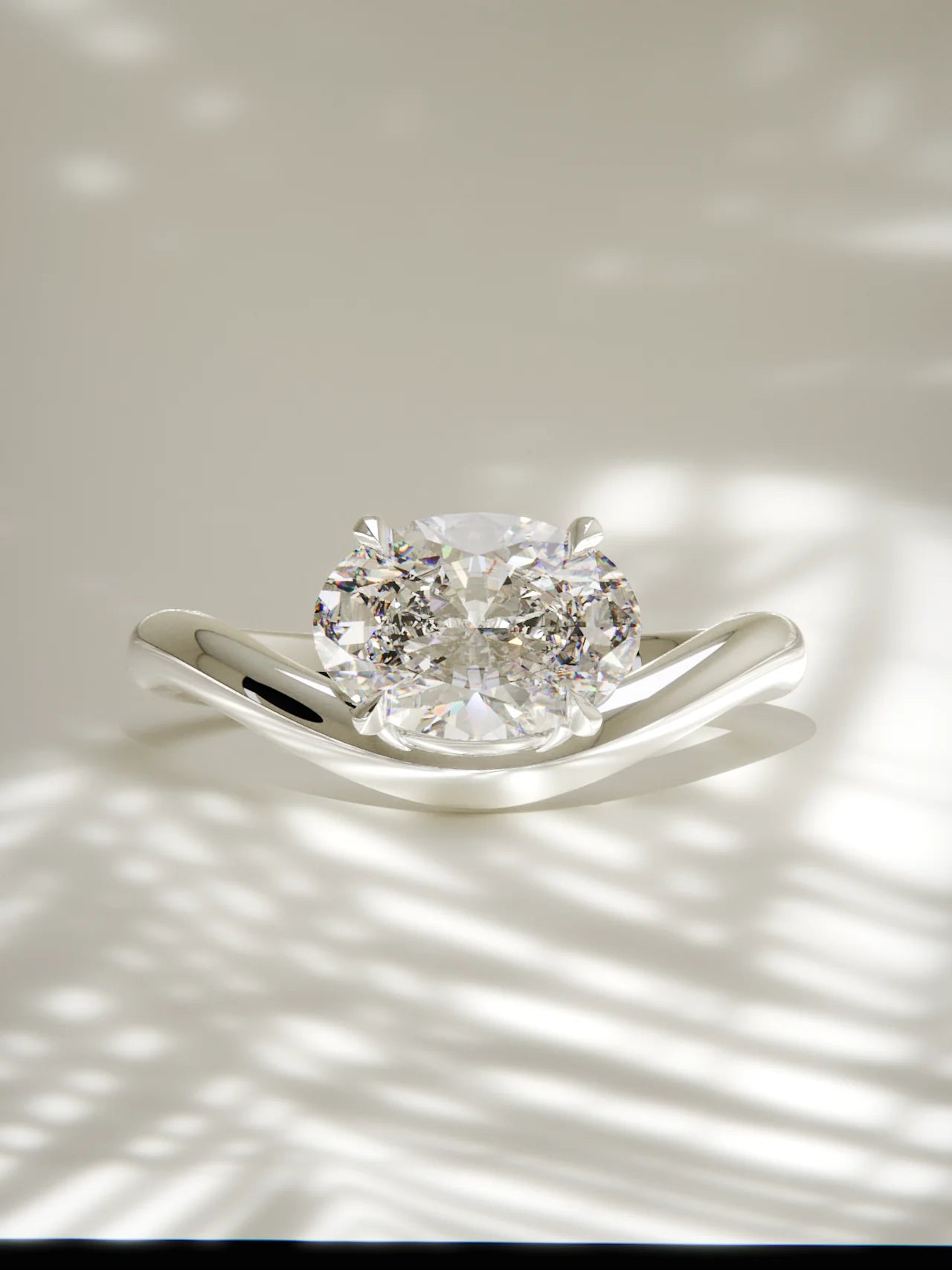 The Arco | East West Oval Solitaire