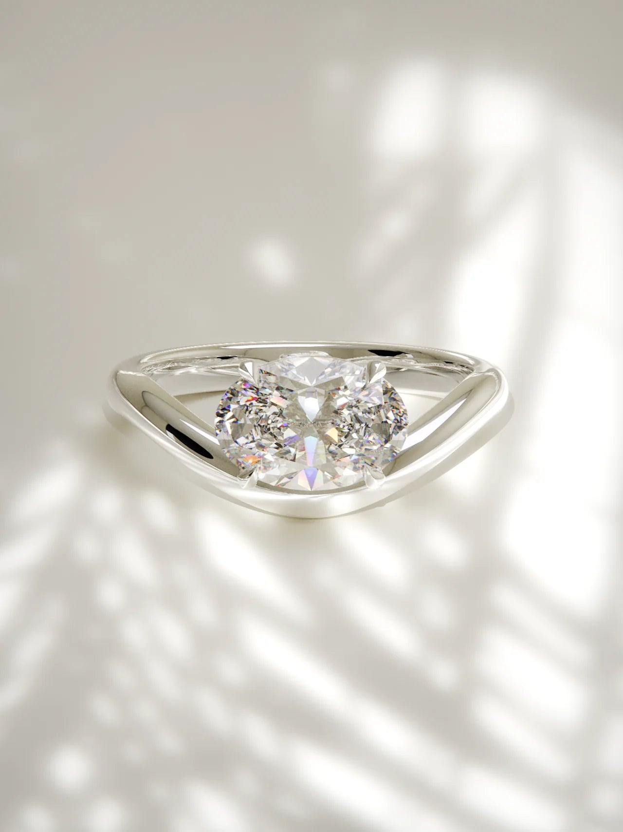 The Arco | East West Oval Solitaire