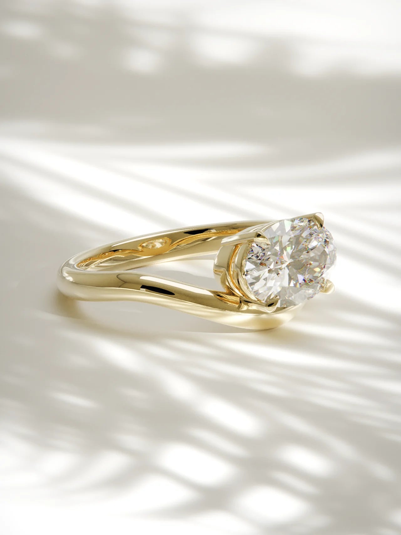 The Arco | East West Oval Solitaire