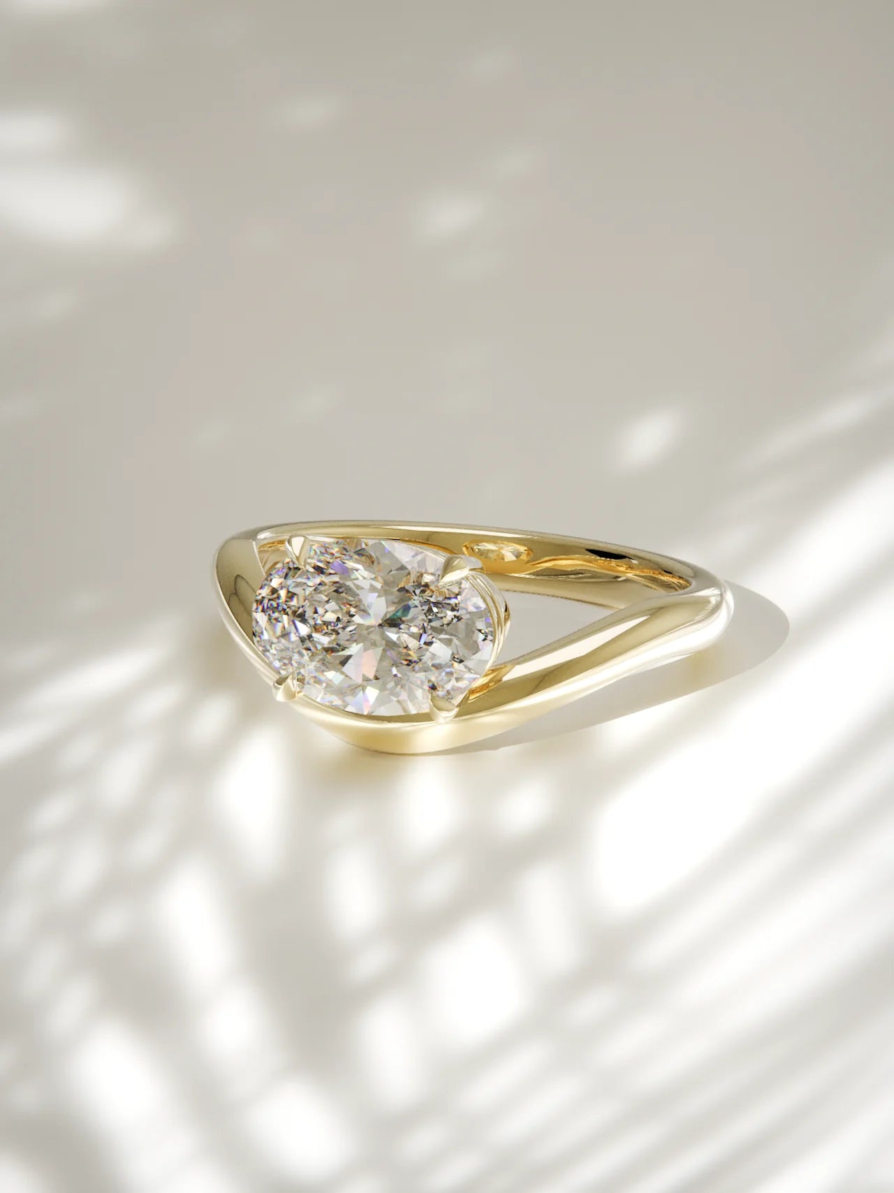 The Arco | East West Oval Solitaire