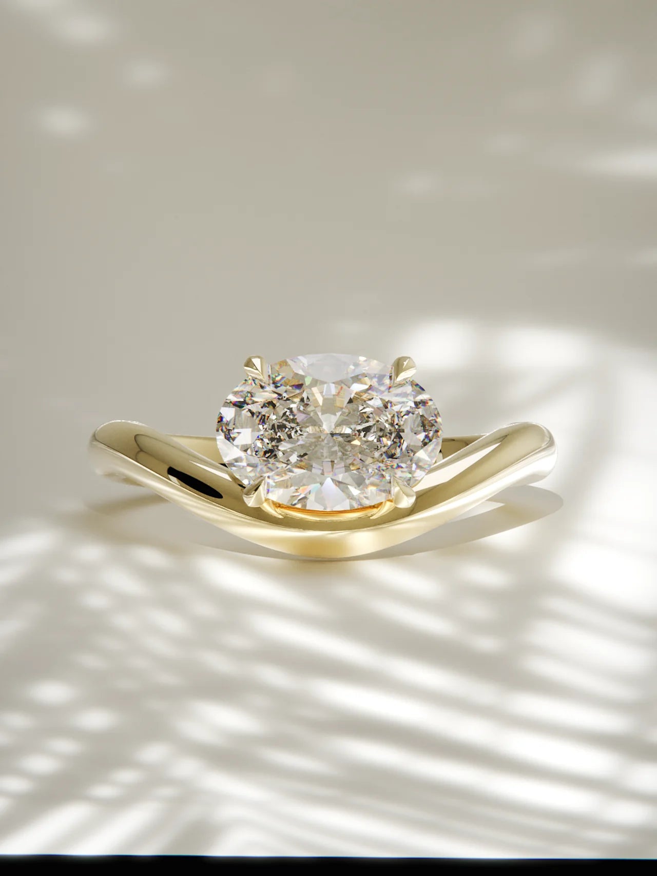 The Arco | East West Oval Solitaire