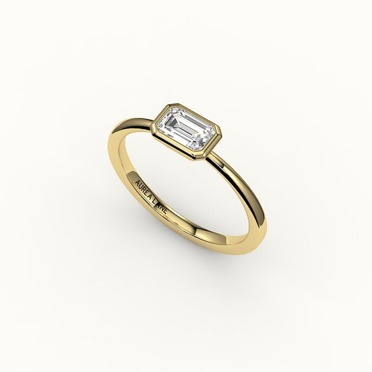 East-West Emerald Cut Bezel Ring Setting
