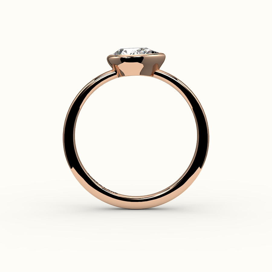 East-West Pear Cut Bezel Ring Setting