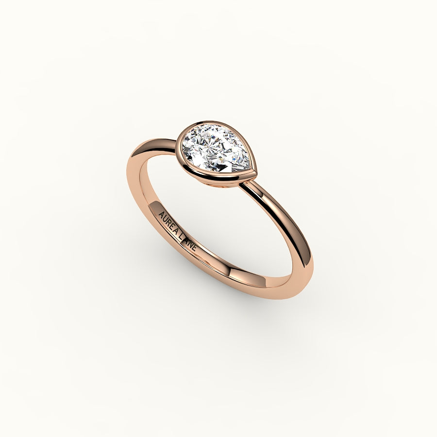 East-West Pear Cut Bezel Ring Setting