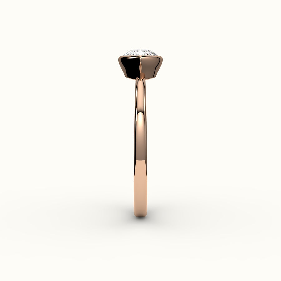 East-West Pear Cut Bezel Ring Setting
