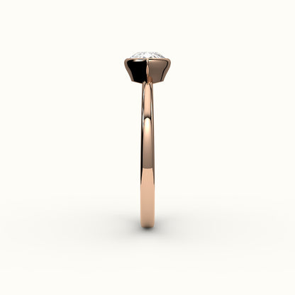 East-West Pear Cut Bezel Ring Setting