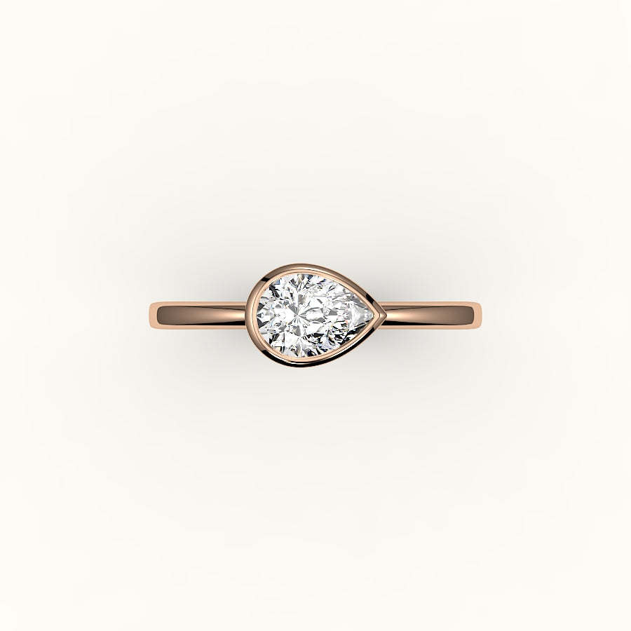 East-West Pear Cut Bezel Ring Setting
