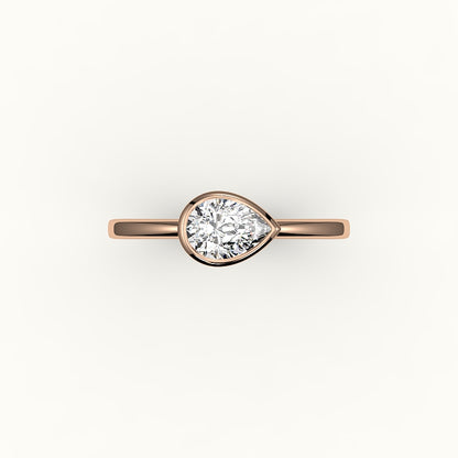 East-West Pear Cut Bezel Ring Setting
