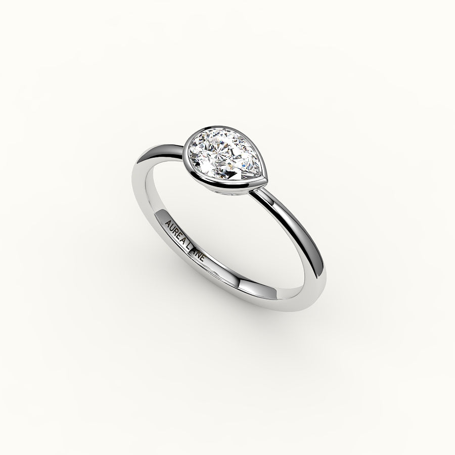 East-West Pear Cut Bezel Ring Setting