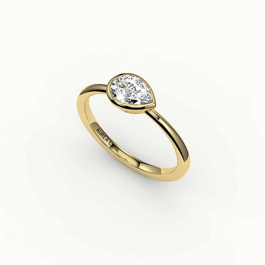 East-West Pear Cut Bezel Ring Setting