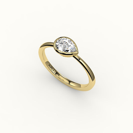 East-West Pear Cut Bezel Ring Setting