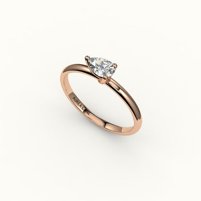 East-West Pear Cut Solitaire Ring Setting
