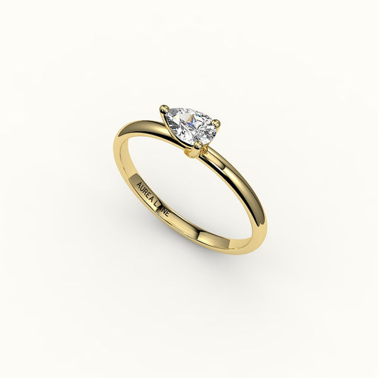 East-West Pear Cut Solitaire Ring Setting