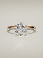 The Iris round lab-grown diamond solitaire in 14K rose gold, 360 turntable video