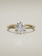 The Dalia round lab-grown diamond solitaire in 14K yellow gold, 360 turntable video