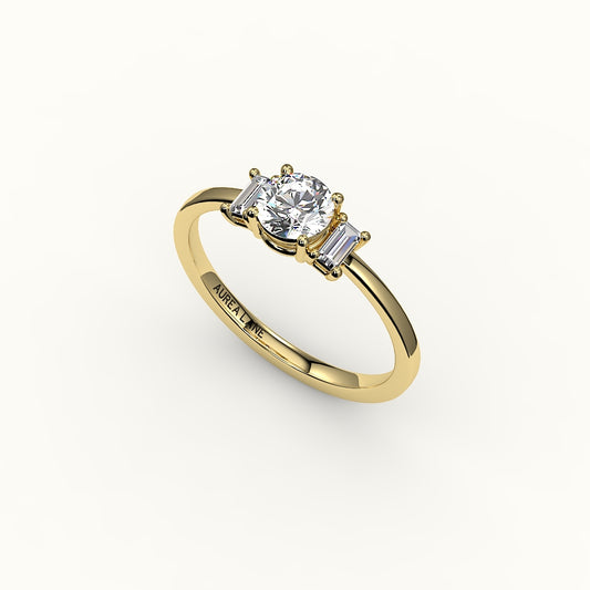 Round Cut Three-Stone Setting with Vertical Baguettes